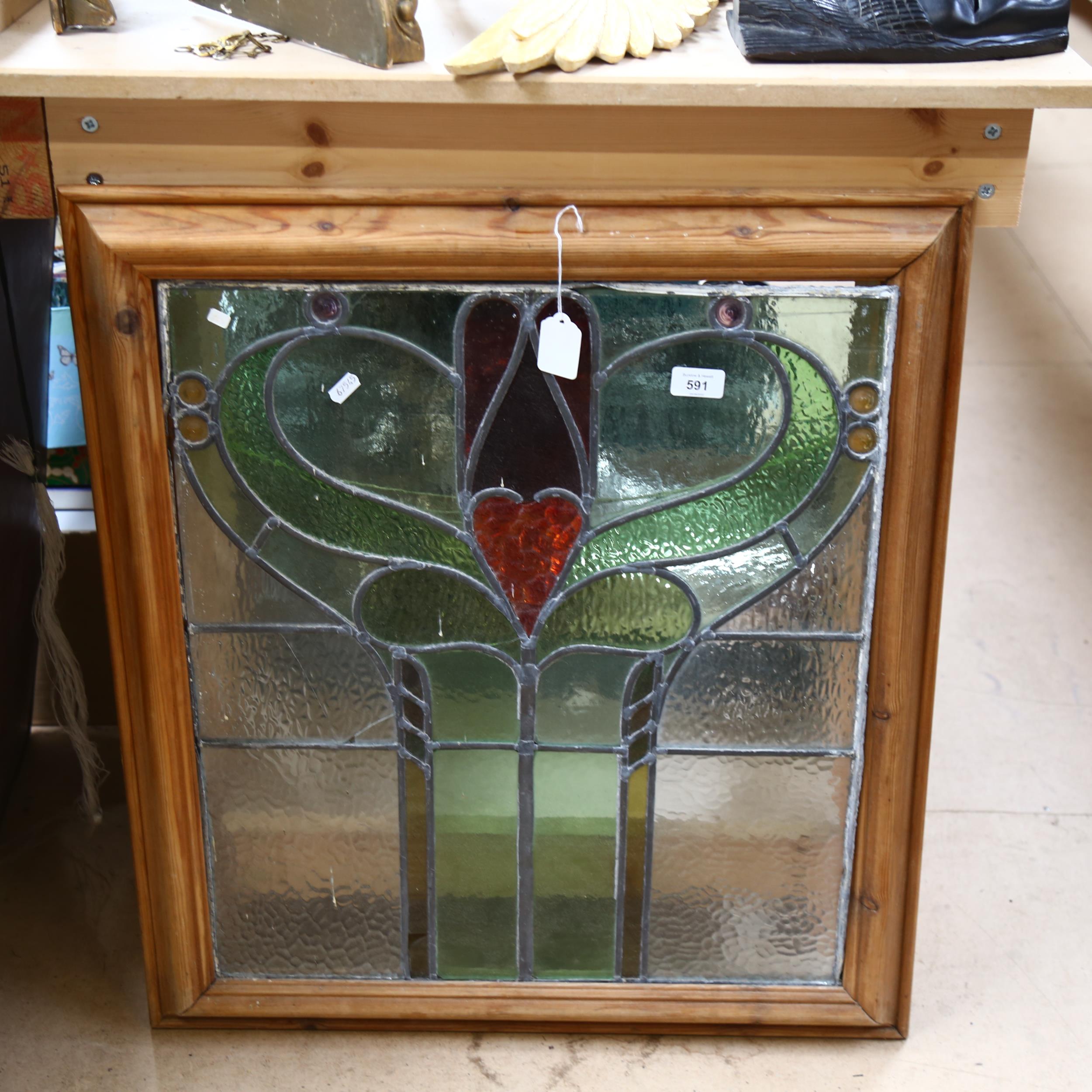 A coloured leadlight glazed panel, pine-framed W65cm, H74cm