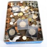 A group of world coins and banknotes