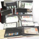 A quantity of Royal Mail First Day Covers and postage stamp albums