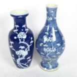 A Chinese blue and white vase with Prunus decoration and 4 character mark, 26cm, and another Chinese