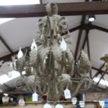 A painted wrought-metal chandelier of foliate design, diameter 48cm approx