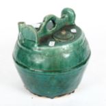 A Chinese green glazed lidded vessel, height 20cm
