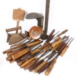 A group of Antique woodworking chisels, tools, measuring tape etc