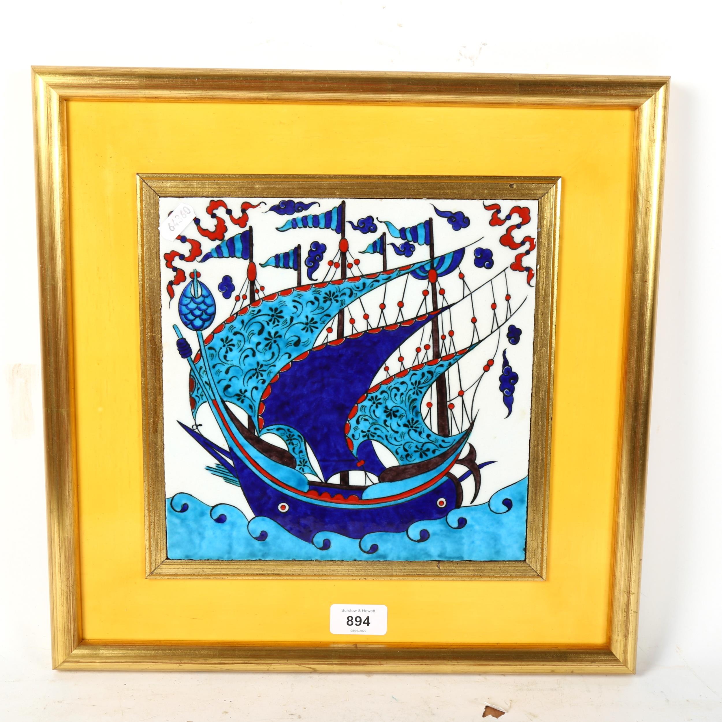 An enamelled tile depicting a sailing ship at sea, framed, height 39cm - Image 2 of 2