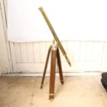 An Antique style brass floor-standing library telescope, on hardwood stand, length 98cm, height 90cm