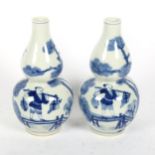 A pair of Chinese blue and white double-gourd vases, 1 with 4 character mark, height 19cm