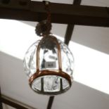 A blown glass pendant light fitting, with copper mounts, approx 20cm across