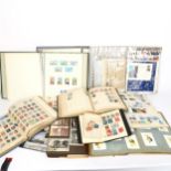 A quantity of postage stamp albums and world stamps