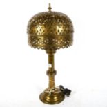 A brass oil lamp and shade converted to electric, height 60cm