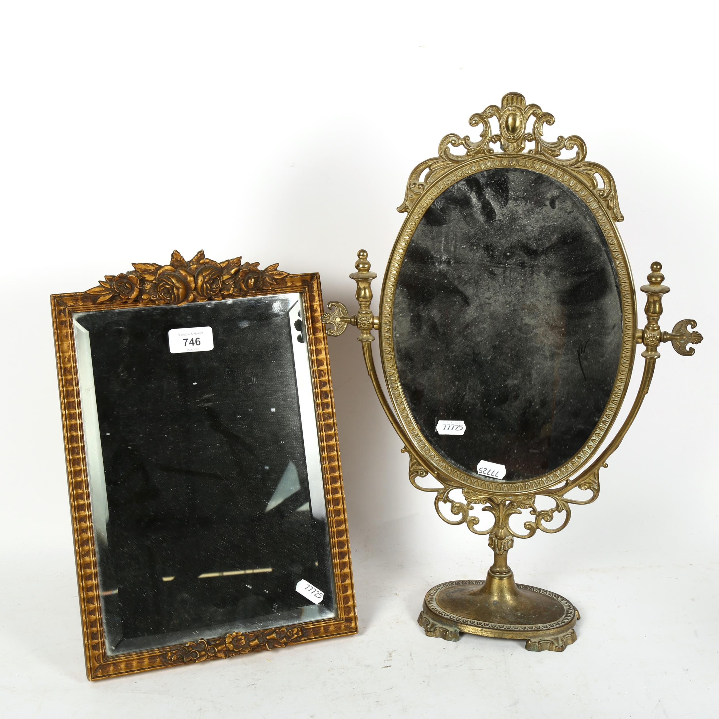 A brass-framed swing toilet mirror, height 49cm