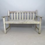 A weathered teak slatted garden bench, L128cm