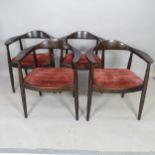 A set of 4 mid-century Danish style armchairs