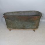 An Antique copper bath, 150cm x 62cm x 56cm