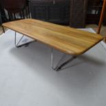 A mid century teak coffee table with lable for Herman Miller, 150cm x 38cm x 60cm