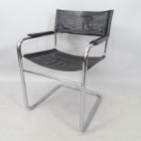 A mid-century Bauhaus style chrome and leather cantilever armchair, with ebonised arm rests