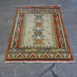 A modern salmon ground Persian design rug, 225cm x 167cm (Viewing by appointment only for this Lot