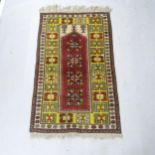 A red and cream ground Turkish prayer rug, 148cm x 90cm