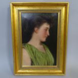 An oil on canvas, portrait study of a young lady in a green dress, monogramed bottom right-hand