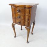 A 1920s walnut serpentine-front 3-drawer bedside chest, 37cm x 71cm x 36cm