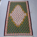 An Iranian Kilim rug, 180cm x 102cm