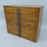 An Antique oak table-top collector's chest of 13 drawers, 69cm x 62cm x 30cm