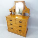 A Victorian satinwood dressing chest, with raised back and adjustable mirror, base fitted with 2