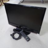 An LG Flatron M2262D 22" TV, with remote control