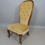 A Victorian mahogany and upholstered button-back nursing chair