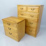 A modern light oak chest of 2 short and 3 long drawers, 71cm x 95cm x 45cm, and a similar light