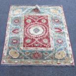 A modern Oriental design wool rug, 204cm x 178cm