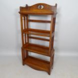 An Arts and Crafts oak open bookcase, with 4 fixed shelves, 62cm x 122cm x 22cm