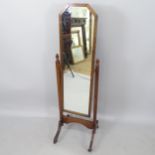 A 1920s oak-framed cheval mirror, H136cm
