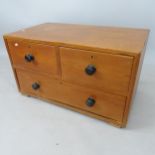 An Antique teak campaign chest of 2 short and 1 long drawer, 89cm x 50cm x 49cm