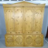 A pine Gothic style 2-section cabinet, 170cm x 198cm x 45cm