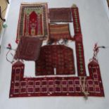 A group of Antique Turkish and Persian saddle bags, mats and wall hangings (7)