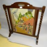 A 1920s oak barley twist fire screen with tapestry panel. H - 72cm.