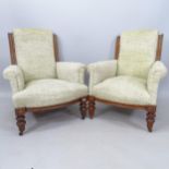 2 similar Edwardian upholstered armchairs, with carved show wood