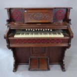 An Antique Harmonium, by Bridgeport Organ Co. USA, with label for Lister & Sons, 120cm x 123cm x