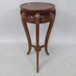 A mahogany jardiniere stand, on cabriole legs, 29cm x 67cm