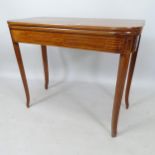 A Regency mahogany fold over tea table, with satinwood-banding and square tapered legs, 91cm x