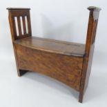 An Antique oak window seat, with lifting top and storage compartment, 81cm x 78cm x 36cm