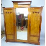 An Antique mahogany Arts and Crafts bedroom suite, comprising a 3-door wardrobe, 190cm x 212cm x