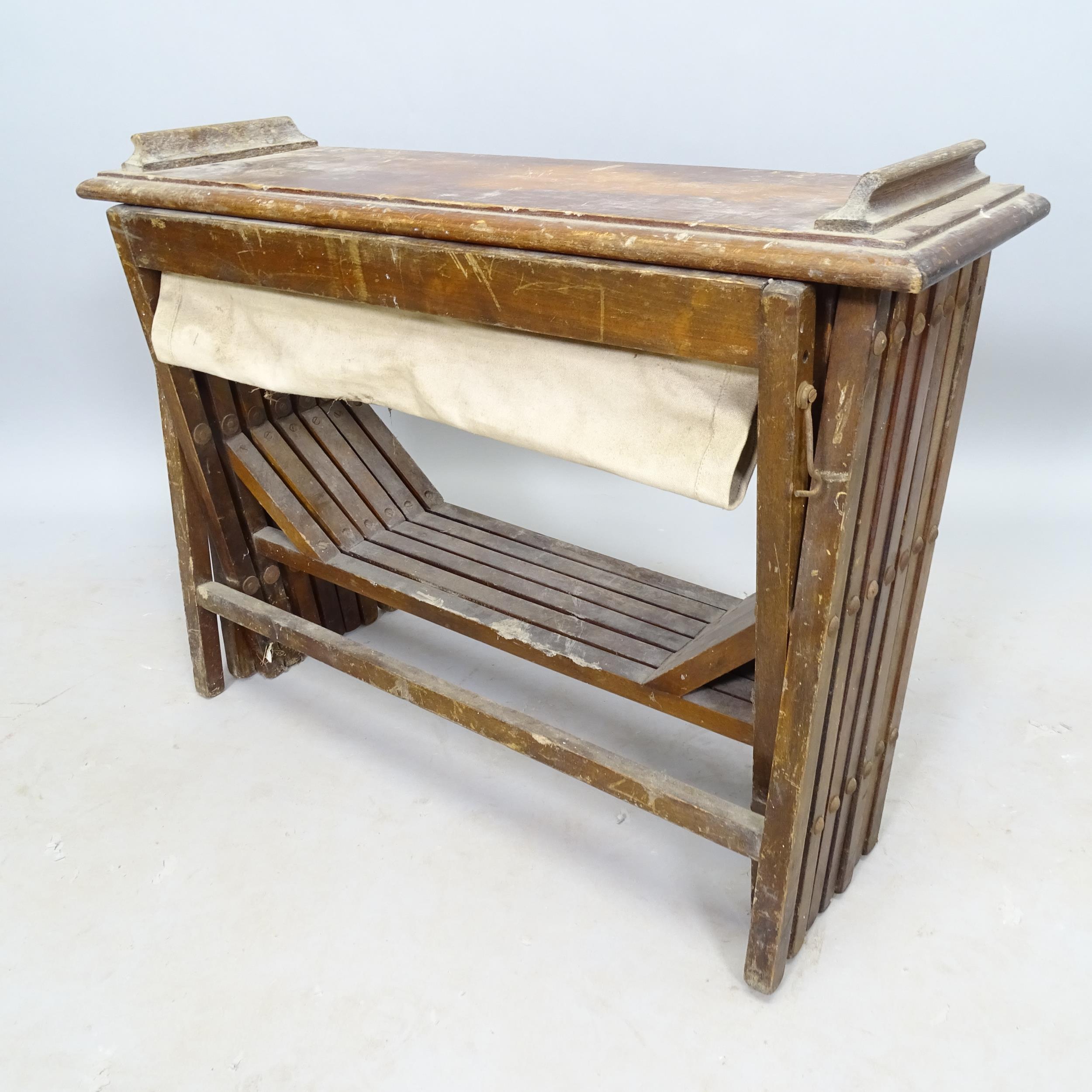 An early 20th century campaign folding bed