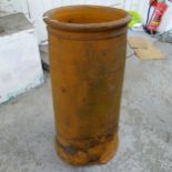 A terracotta chimney pot, 33cm x 77cm