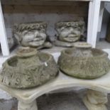 A pair of weathered concrete circular garden urns on stand, 40cm x 35cm, and a pair of garden