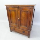 An Antique mahogany side cabinet, with 2 panelled doors and drawer under, 68cm x 86cm x 42cm