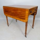 An Antique crossbanded mahogany and ebony-strung Pembroke table, with end frieze drawer and inlaid