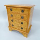 A small burr-walnut veneered chest of 4 drawers, on bracket feet, 42cm x 52cm x 30cm
