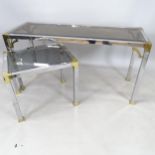 A contemporary design chrome and brass rectangular console table, with bevel-glass top, 128cm x 64cm