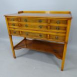 A yew wood washstand with raised gallery, 9 short drawers, and shaped shelf under, 97cm x 85cm x